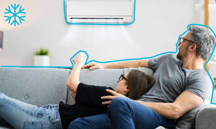 Muž so ženou sediaci pod klimatizácoiu od ZSE