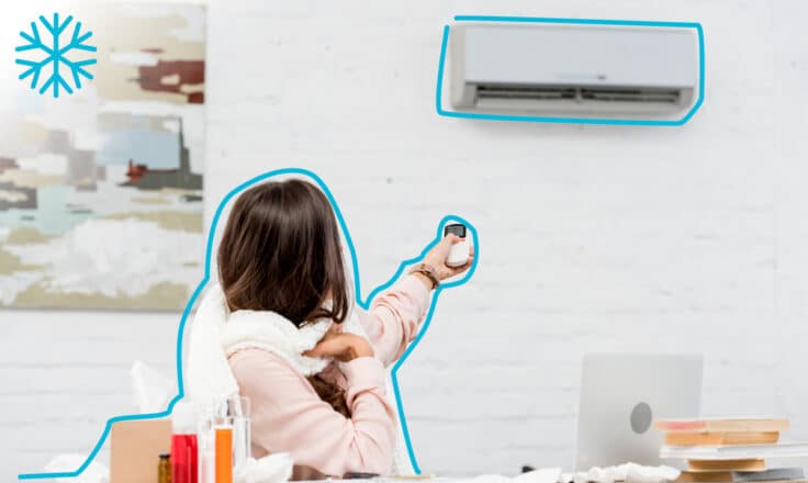 Žena sediacia v práci pod klimatizáciou