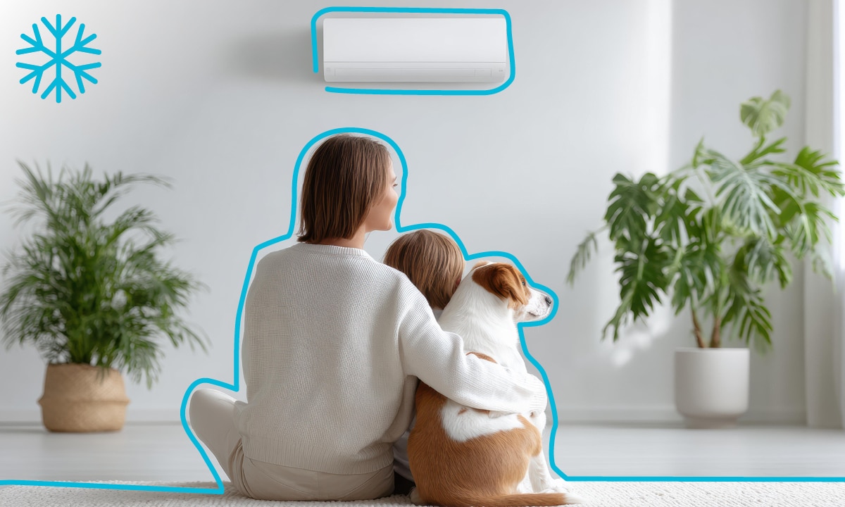 Žena, dcéra a pes sediaci pod klimatizáciou.
