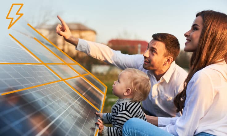 Rodina pozerajúca sa na fotovoltické panely.